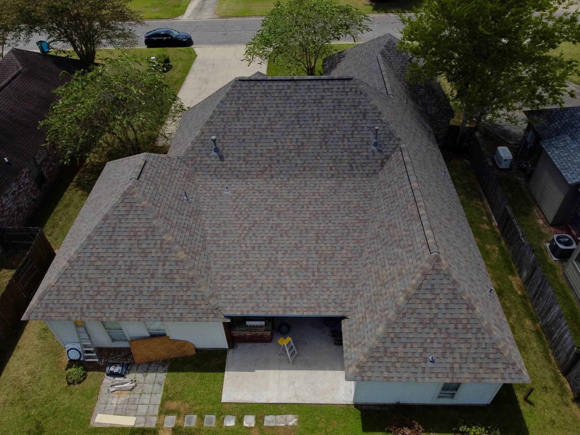 Rear view of the home after roof replacement