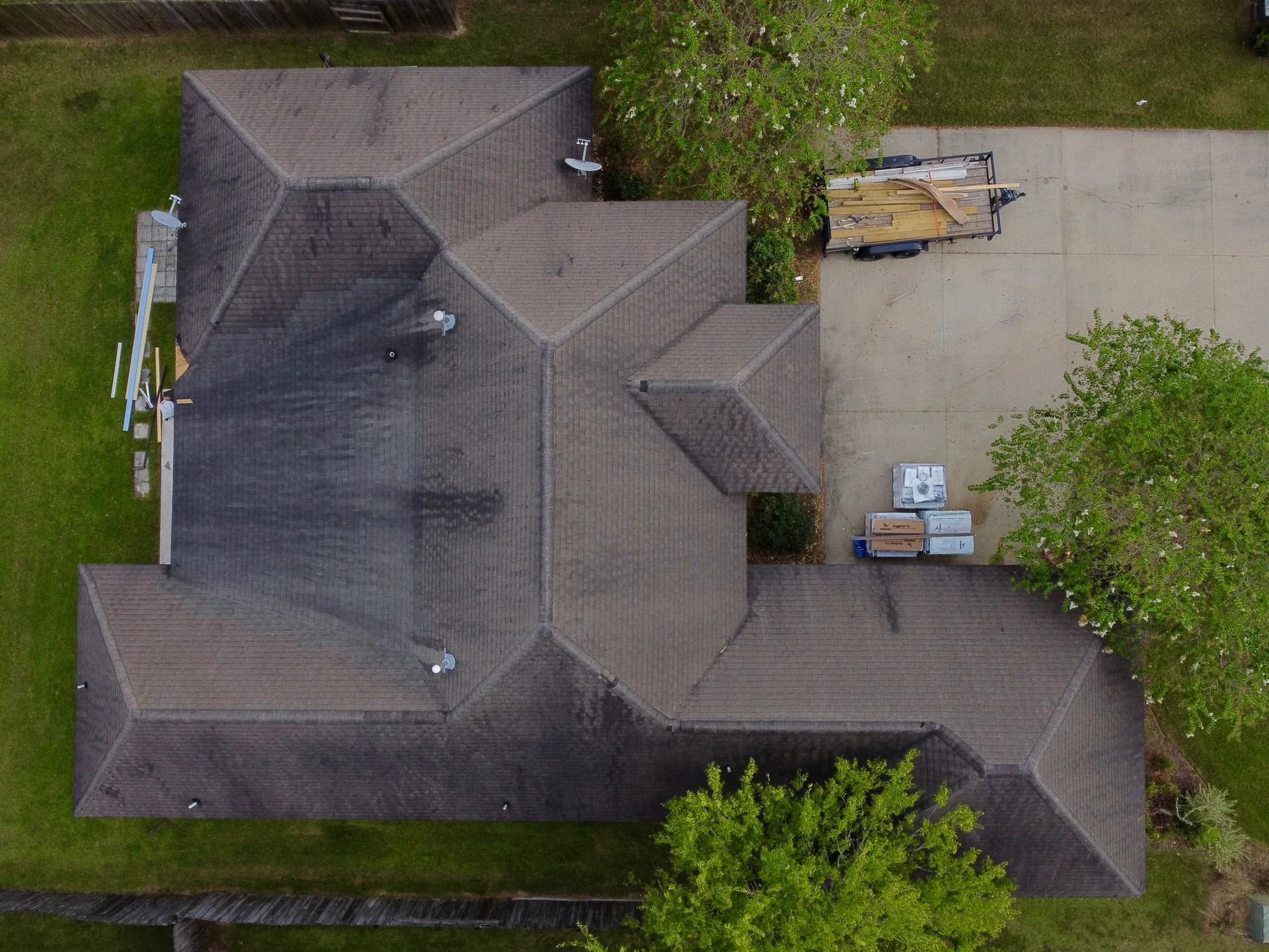 Old streaked roof, top-down drone view